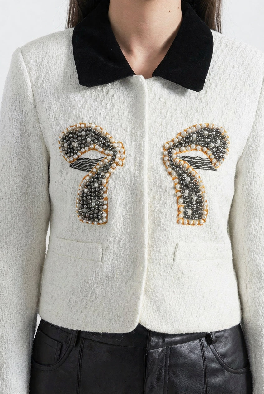 Blazer en tweed avec éléments contrastants et accent nœud métallique - Blanc