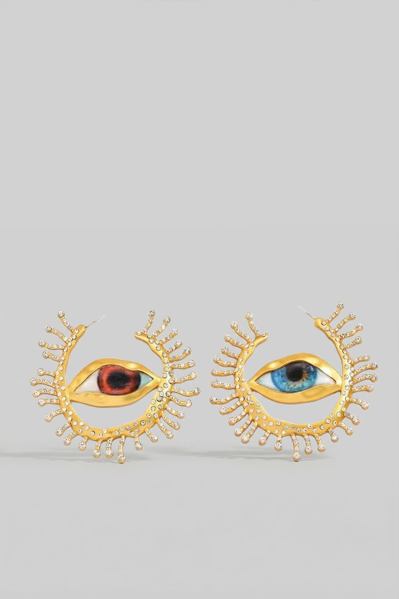 Statement Eye Stud Earrings with Crystal Ray Details – Gold