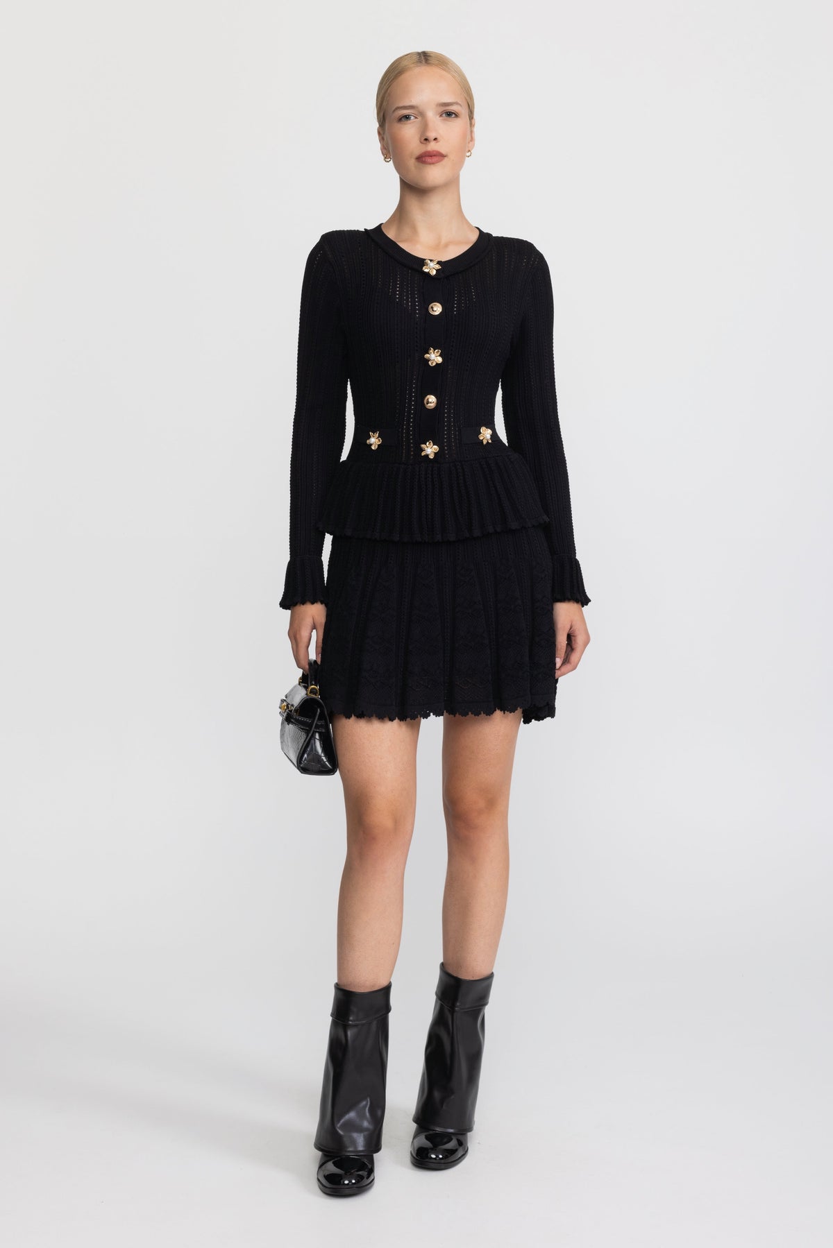 Mini-robe péplum en maille pointelle à boutons fleur - Noir 