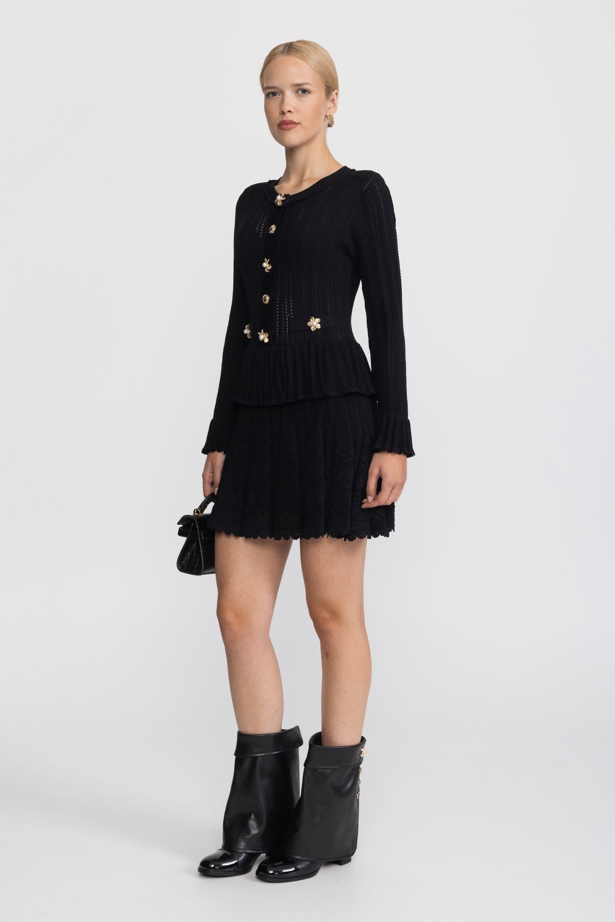 Mini-robe péplum en maille pointelle à boutons fleur - Noir 
