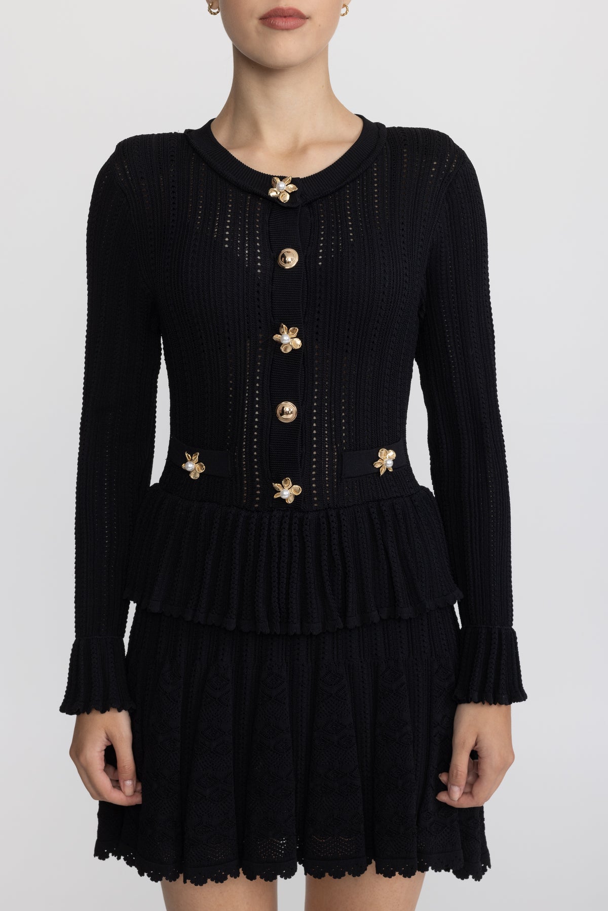 Mini-robe péplum en maille pointelle à boutons fleur - Noir 