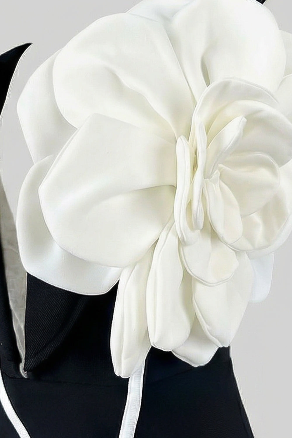 Structured Midi Dress with Sculpted Floral Accent – Black